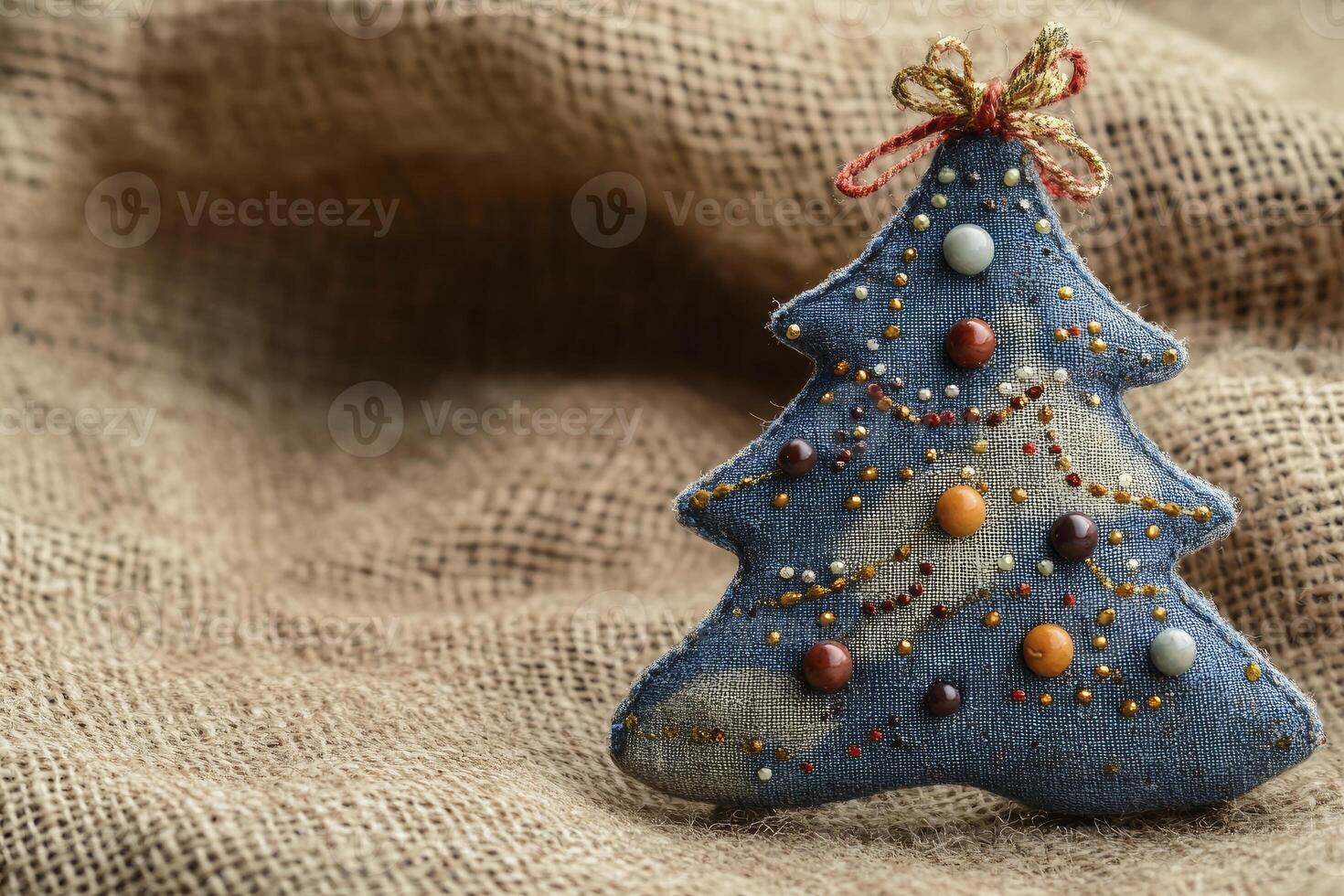 Denim Christmas Tree Ornament on Burlap for Holiday Craft Projects photo