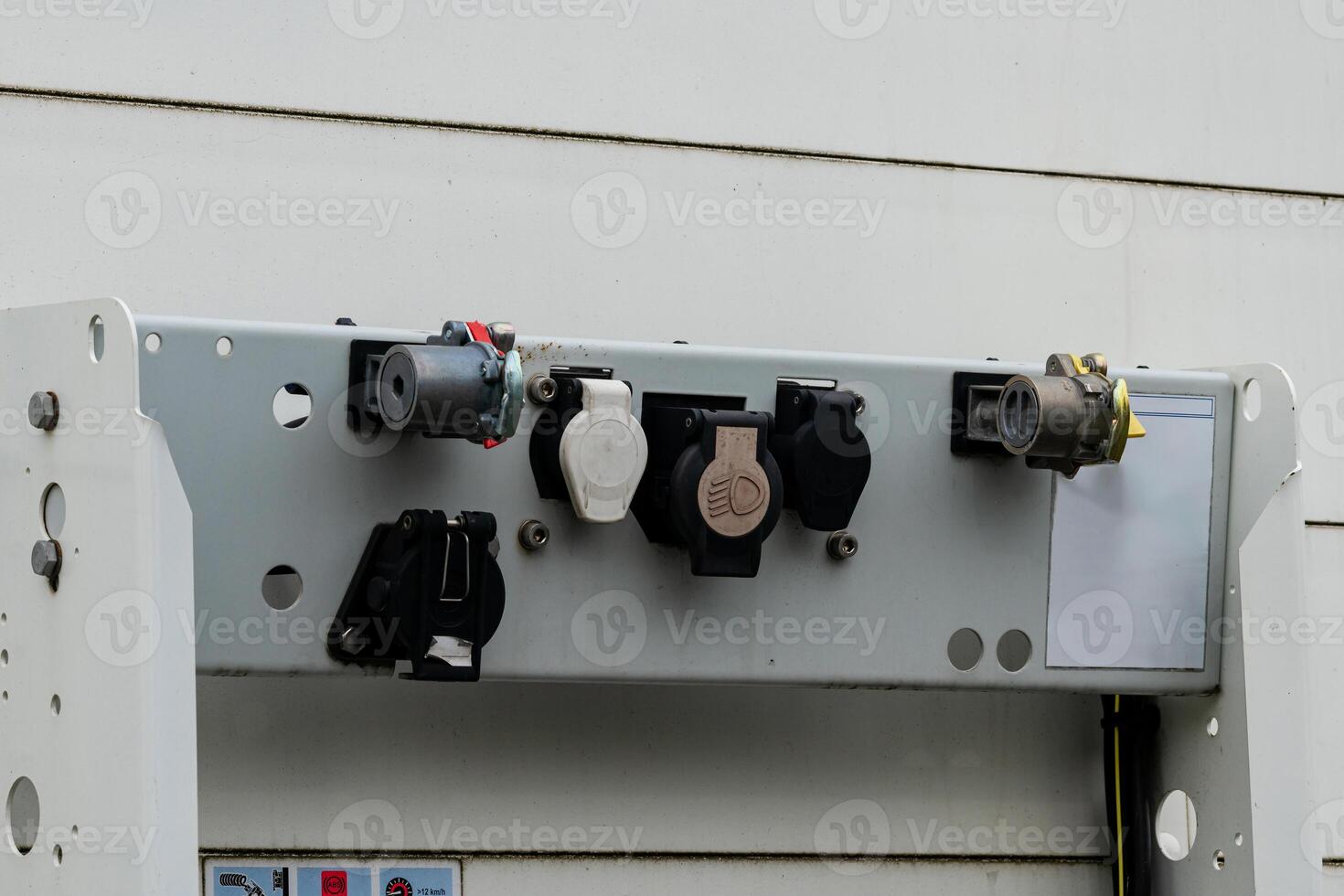 Multiple electrical connections are securely installed on a metal photo