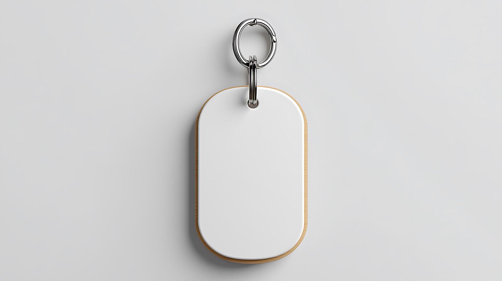 A white keychain with a metal ring on it photo