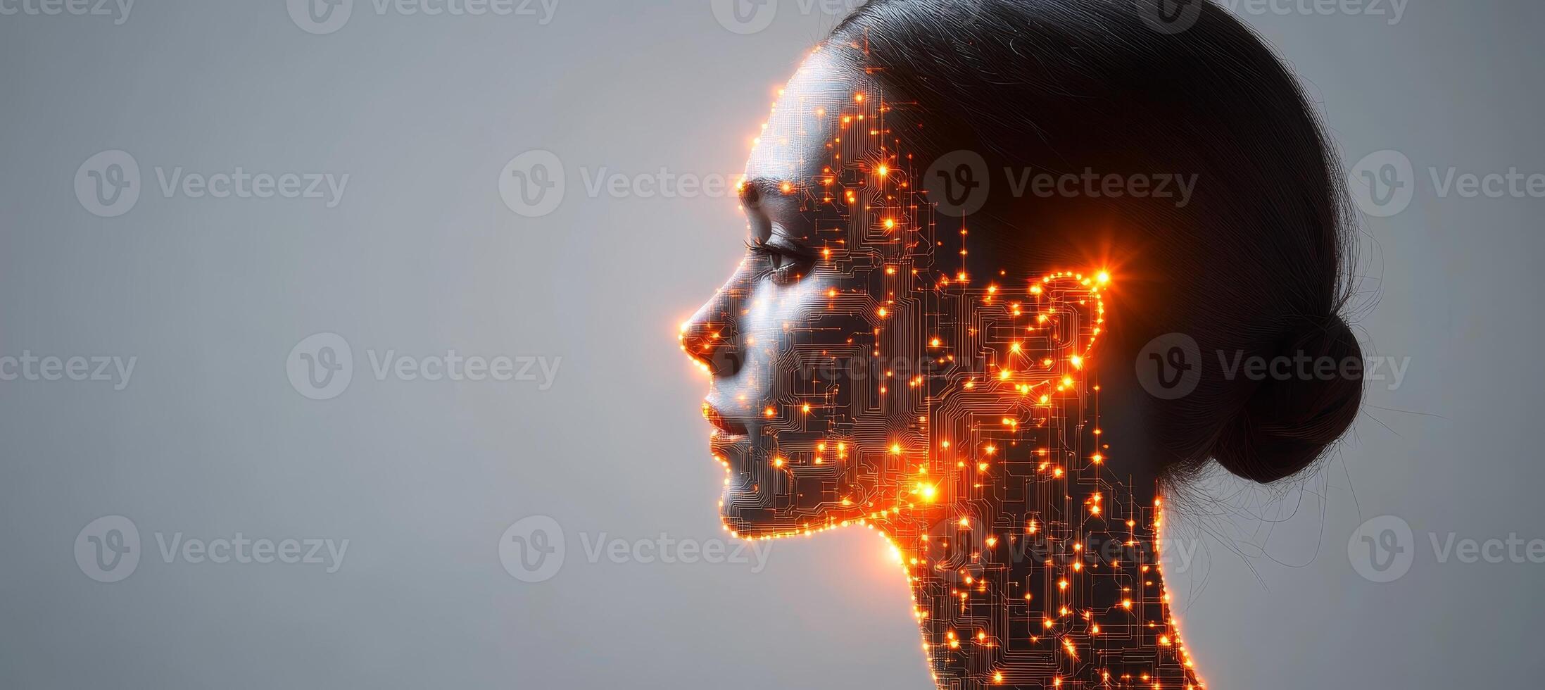 Abstract Profile of a Digital Face with a Glowing Circuit Pattern on a Light Gray Background photo