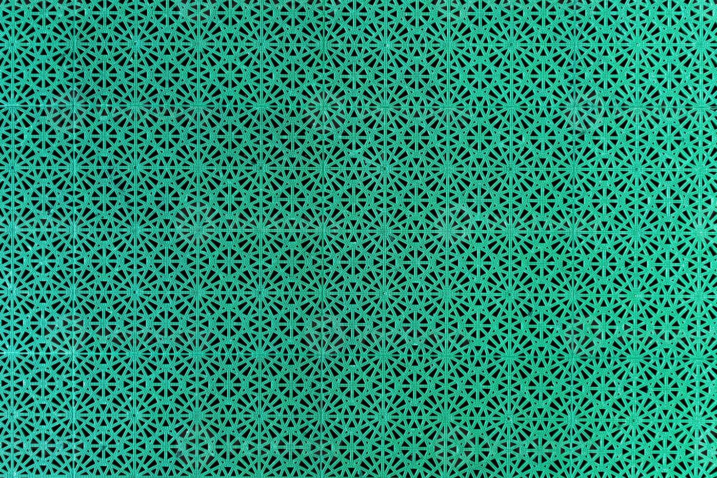 This seamless retro gingham fabric pattern features a mint green background with a classic white design. Ideal for backgrounds, fashion, and home decor, it adds a charming touch to any project. photo