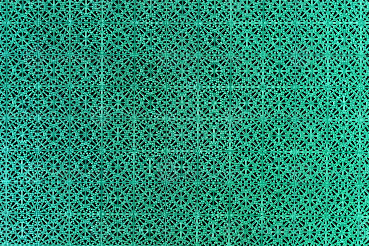 Repeating geometric shapes create an optical illusion of three-dimensional space. This seamless pattern in retro style good for web design, fabric prints, and more. photo