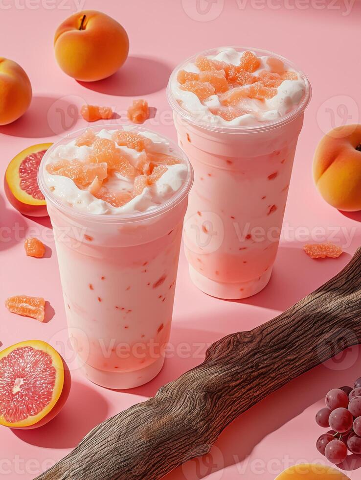 Two cups of a drink with ice and an orange slice in the middle photo
