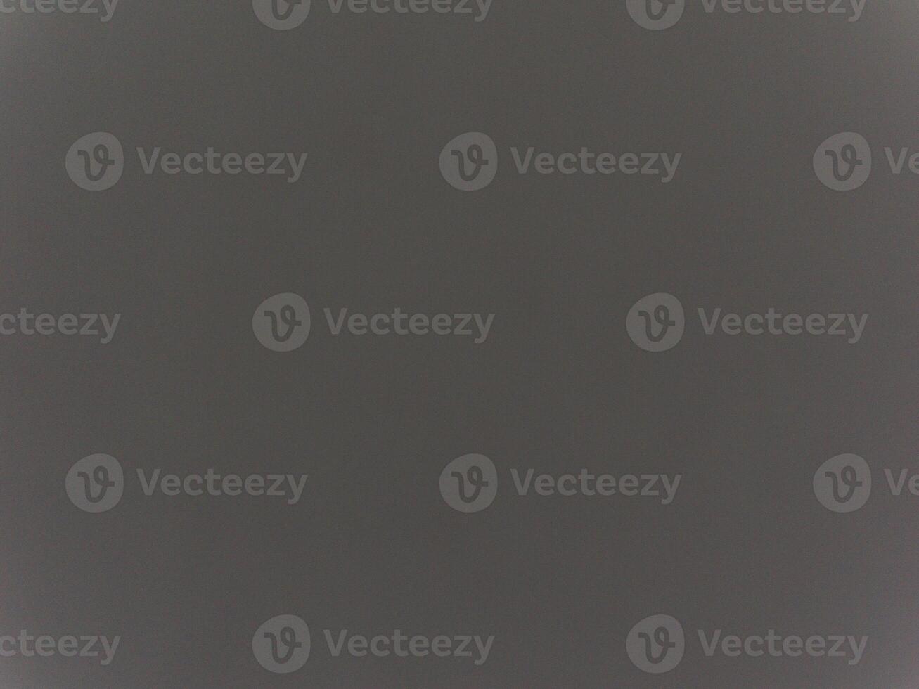 A gray background with no visible objects photo
