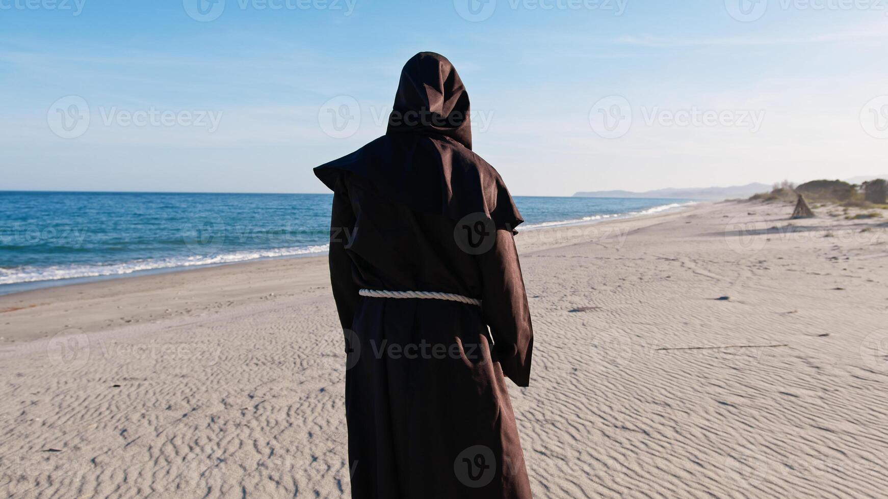 Monk Finding Peace At The Beach photo
