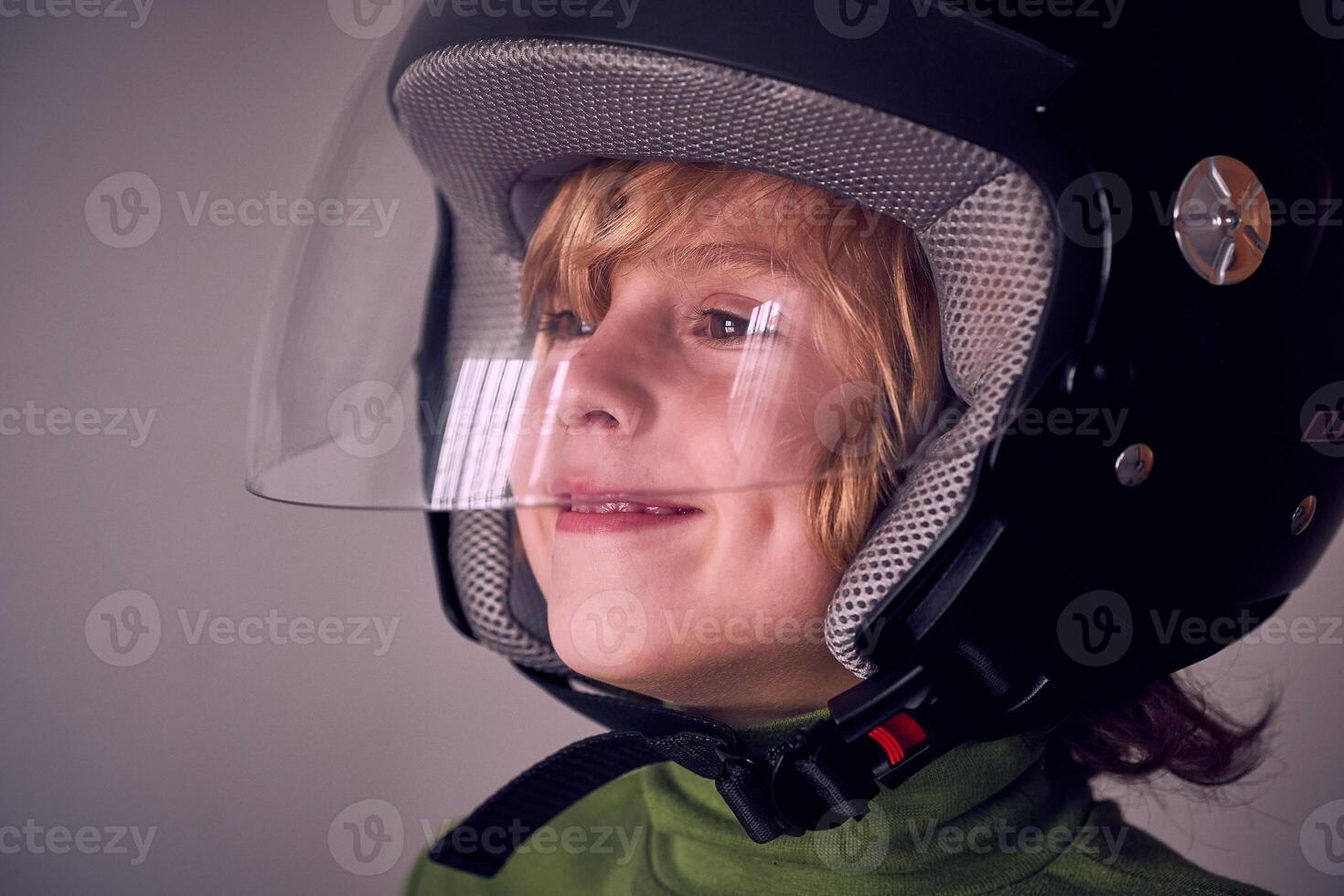 Happy little boy in safety helmet photo