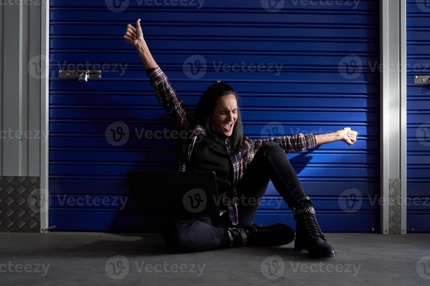 Exited woman near self storage photo