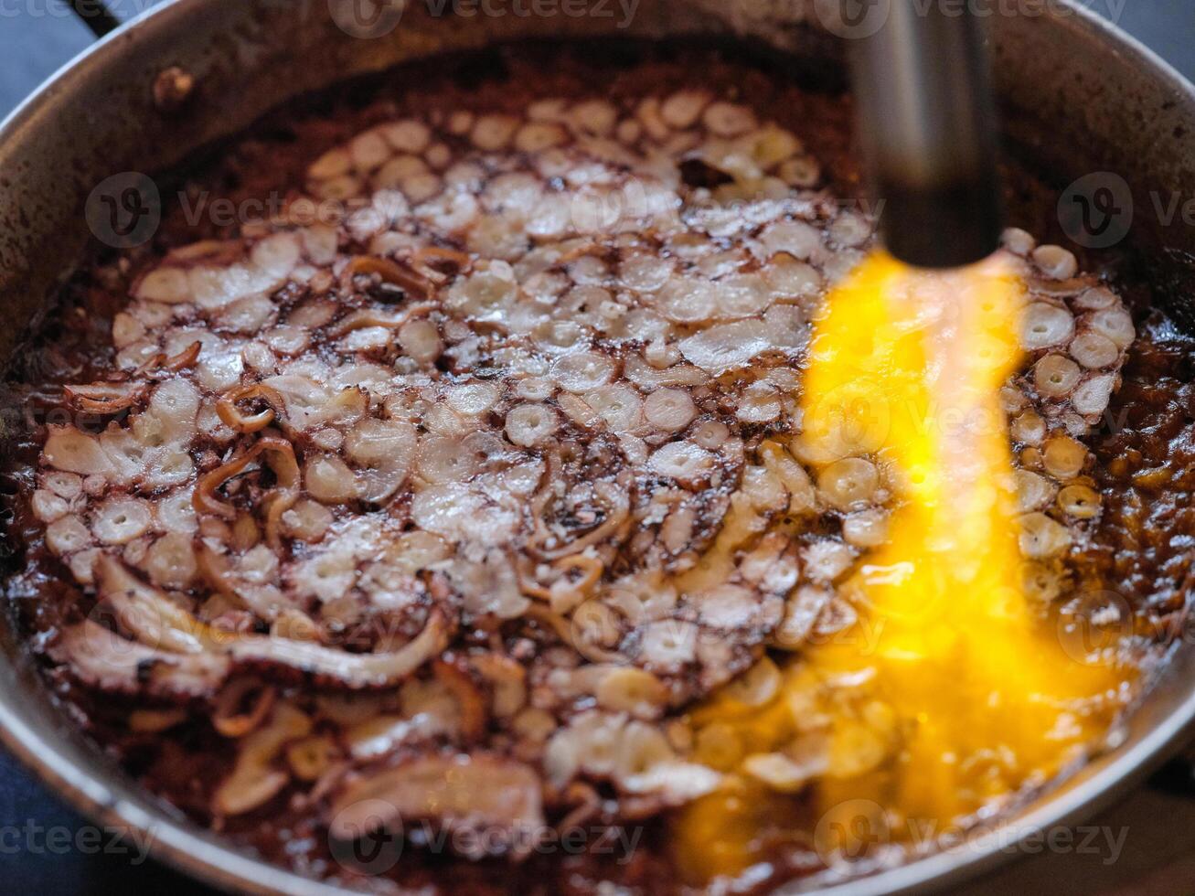 Shallow pan of traditional paella photo