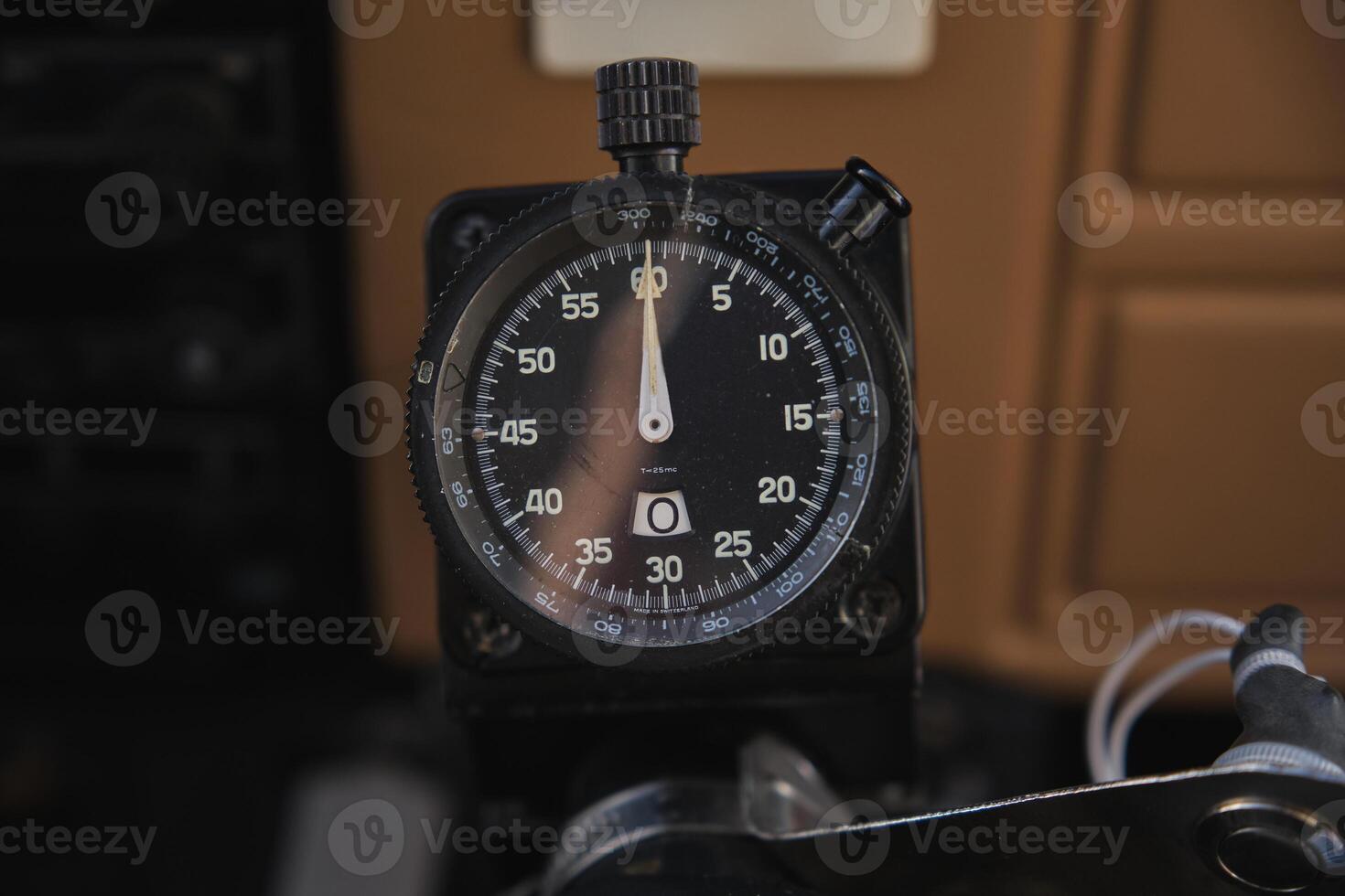 Cockpit stopwatch with button and scales in airplane photo