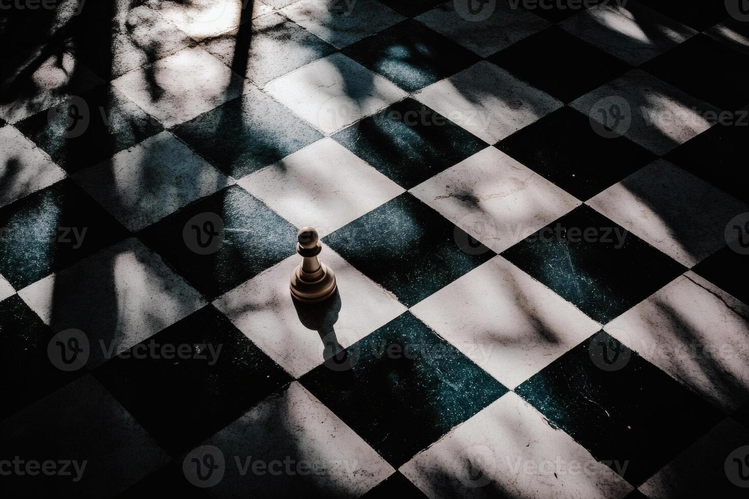 Chess piece standing alone on a checkered board under soft sunlight with shadows creating a dramatic effect photo