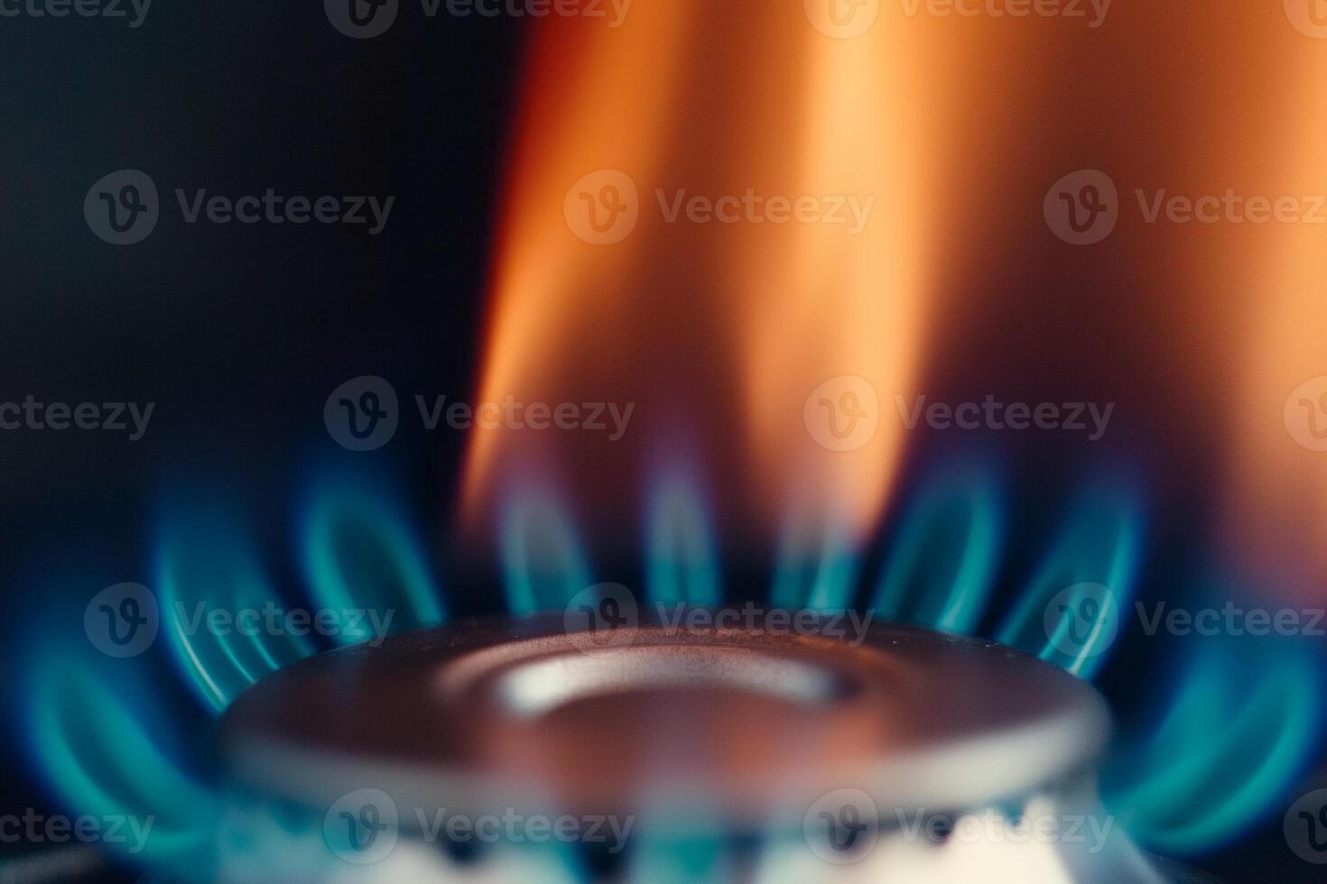 Flames dance on a gas burner in the kitchen. photo