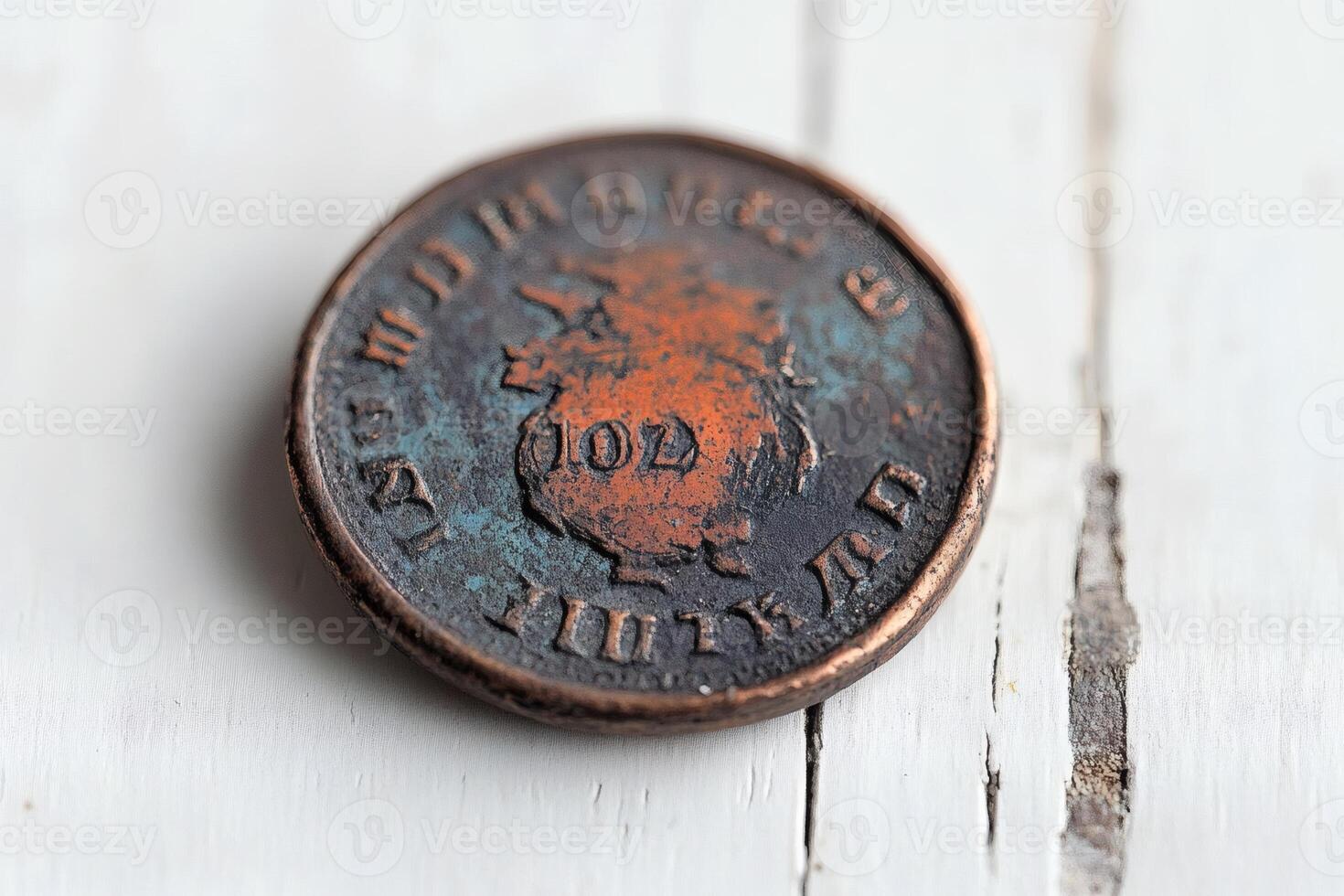Old copper coin displaying intricate details and history. photo