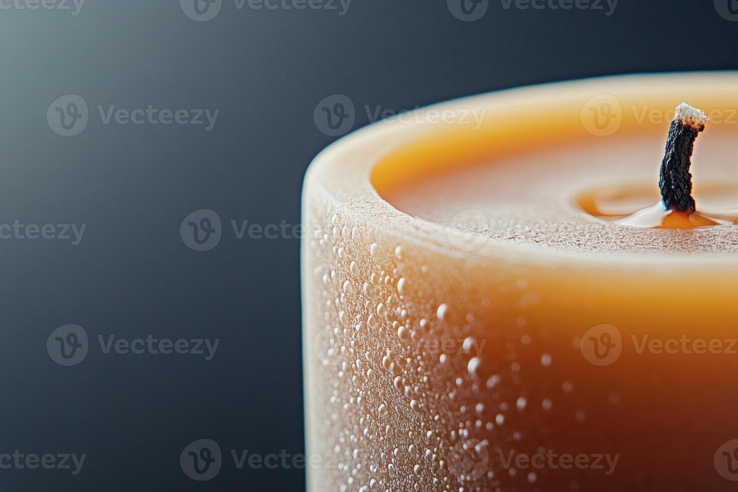 Warm glow of a candle illuminating a tranquil space. photo