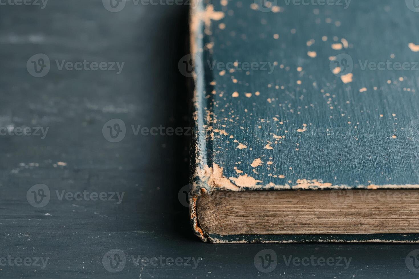 Vintage book rests on a rustic table with charm. photo
