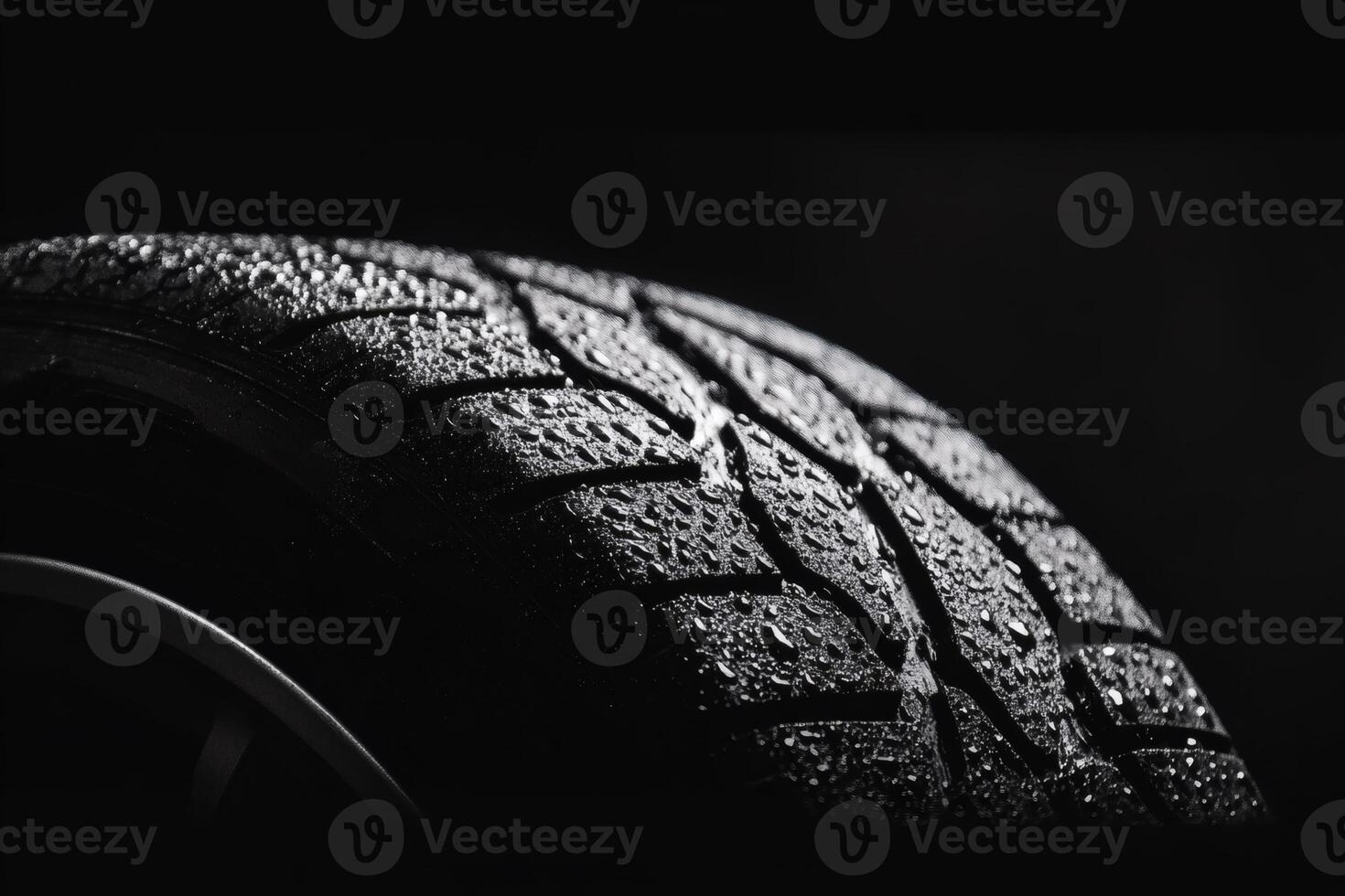 Capturing the essence of a wet tire in dim light. photo