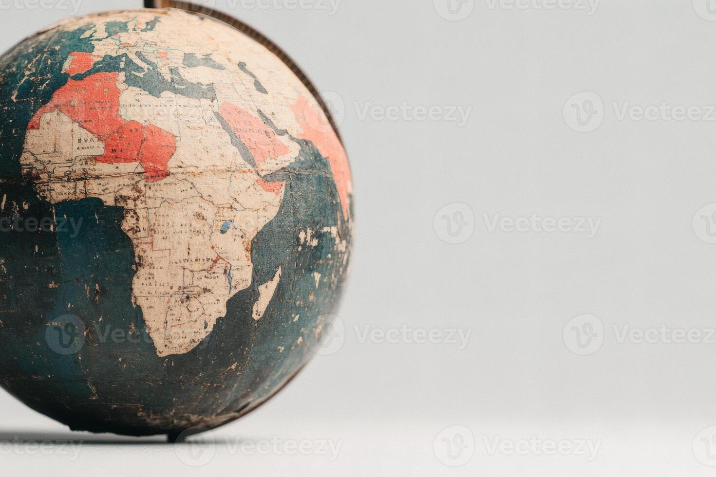 Discovering the world through an antique globe. photo