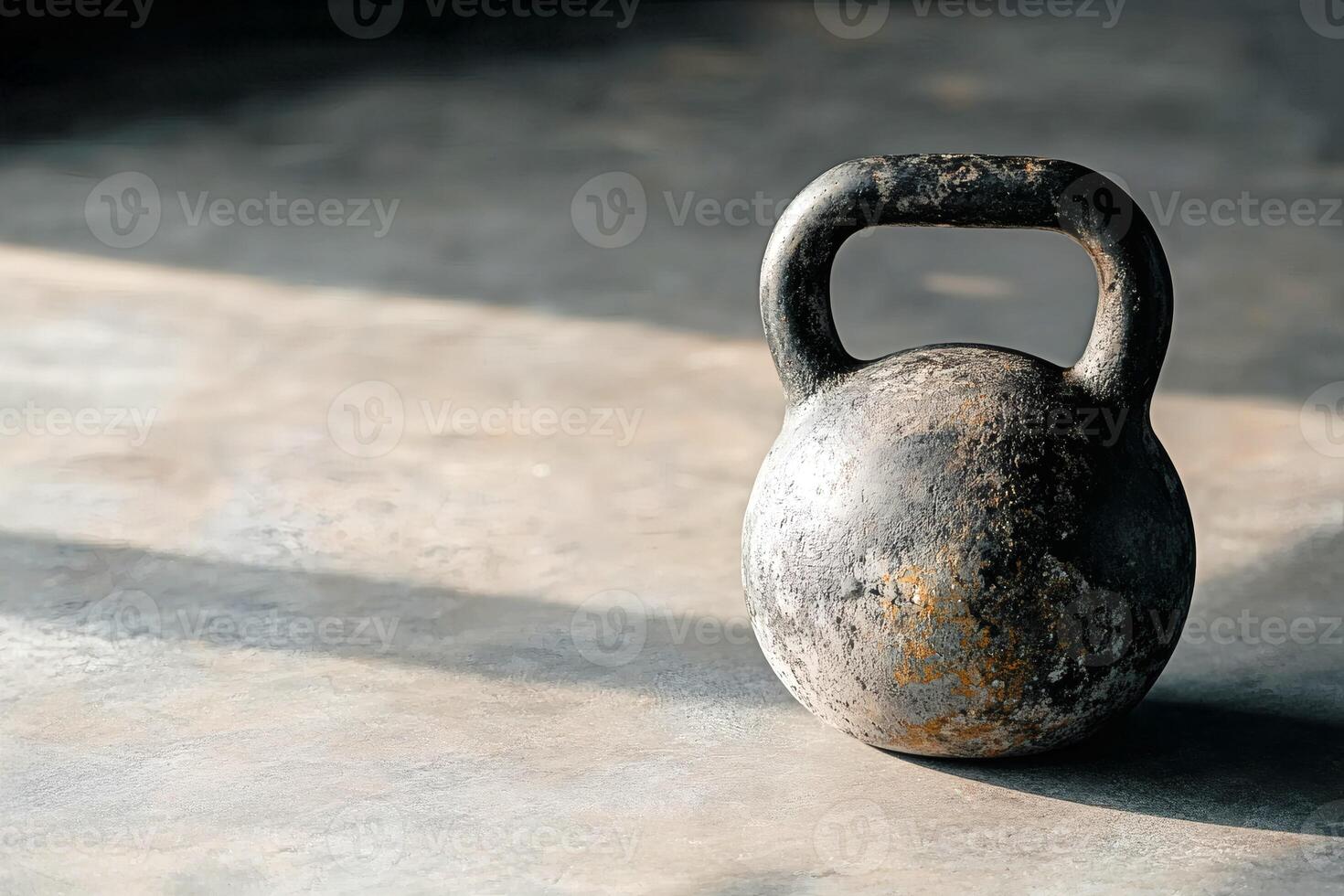 Captivating kettlebell resting on a rustic surface. photo