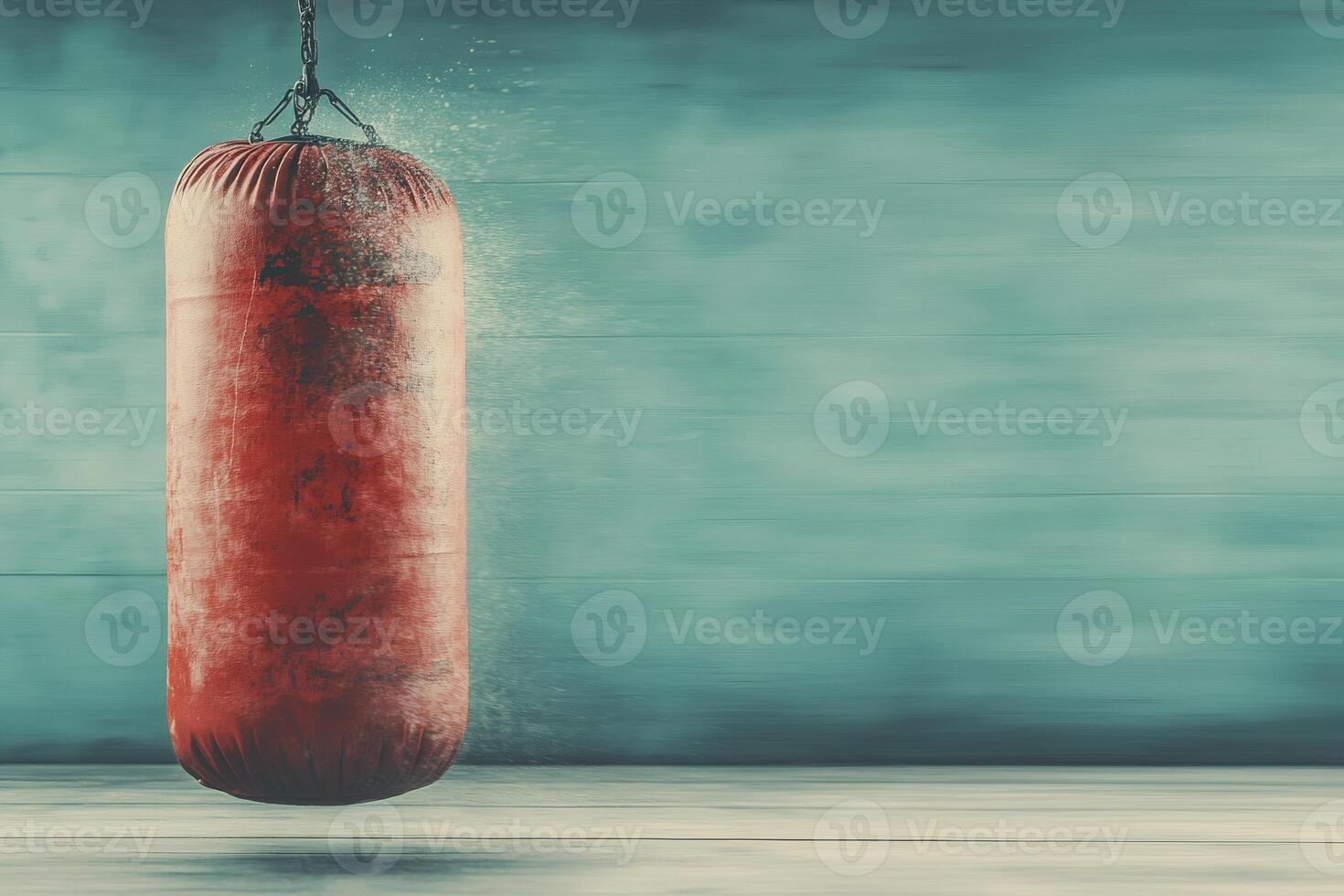 Dynamic energy of a swinging punching bag in a workout space. photo