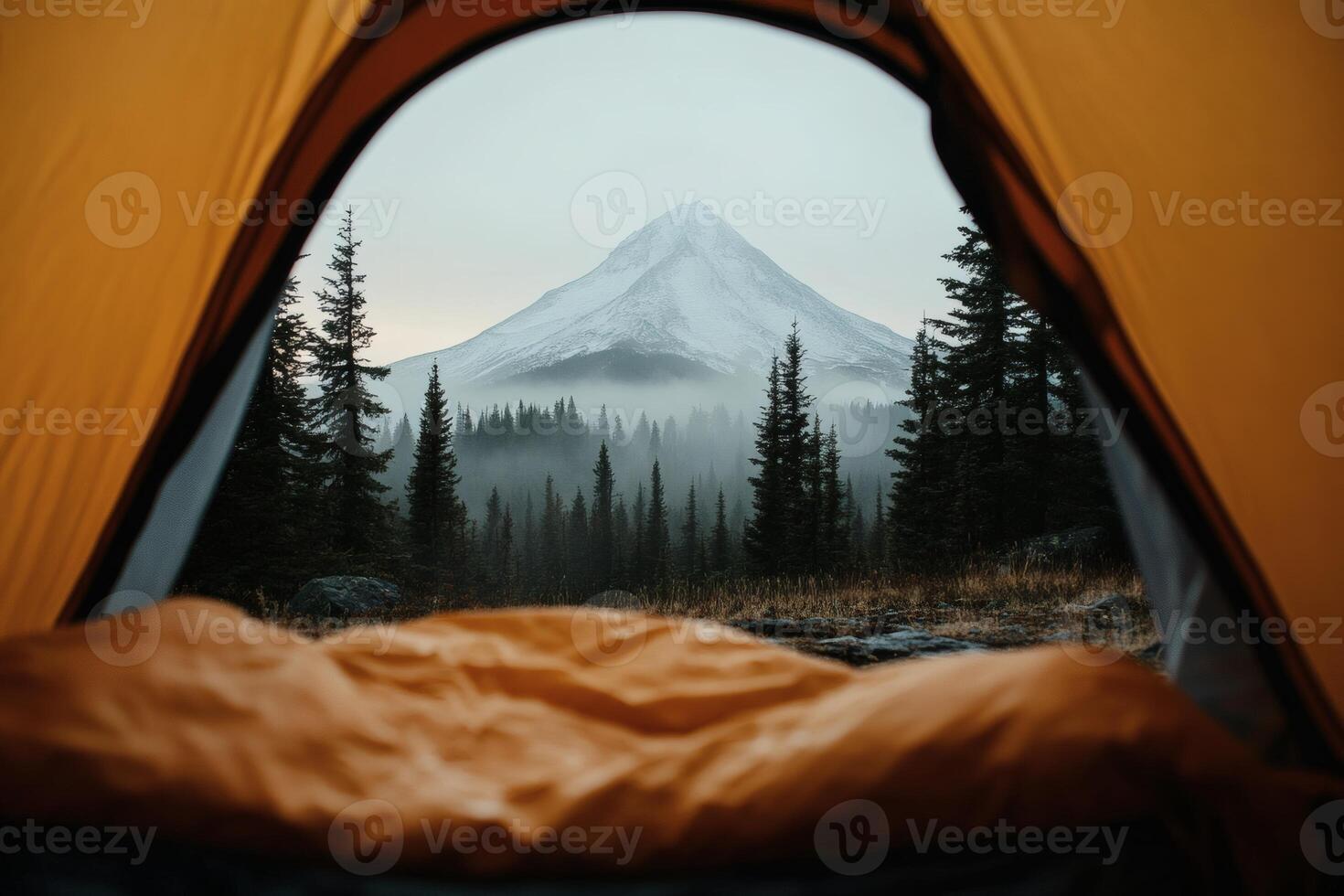 View of a majestic mountain from a cozy tent. photo
