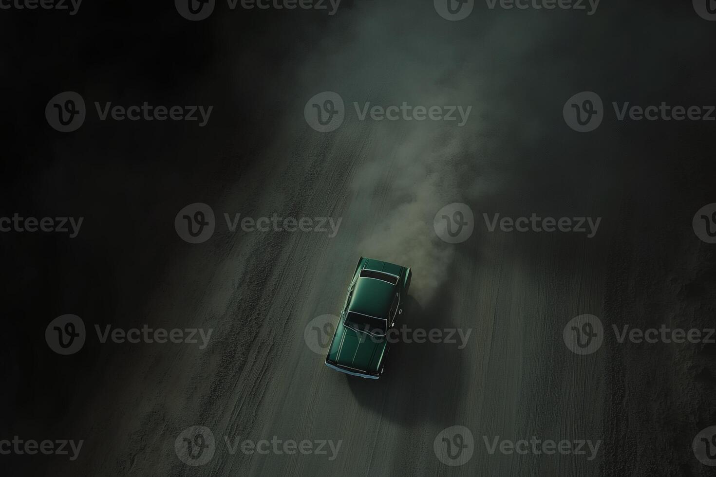 Classic car navigating a dusty road at dusk. photo