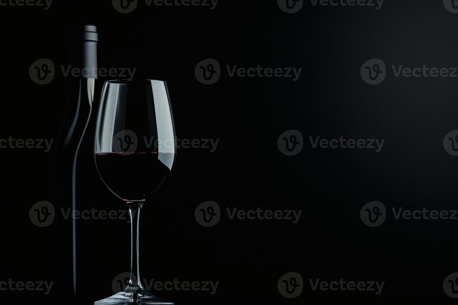 Captivating elegance of red wine against dark backdrop. photo
