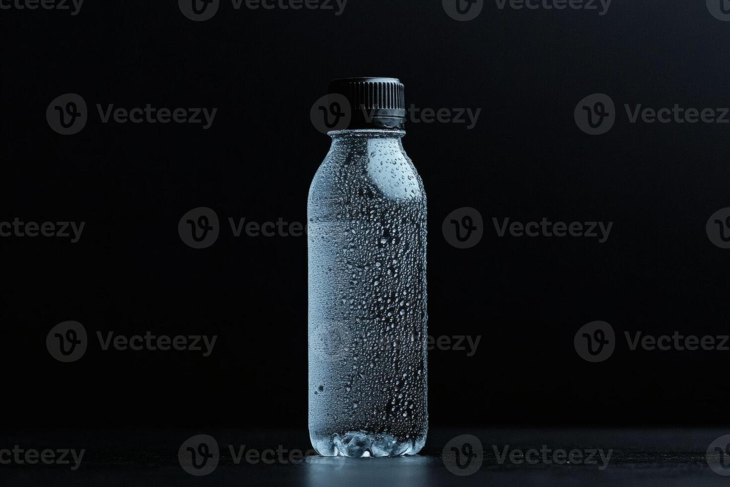 Clear water bottle glistening with condensation. photo
