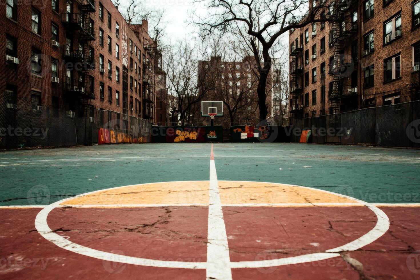 Urban basketball court in a vibrant neighborhood setting. photo