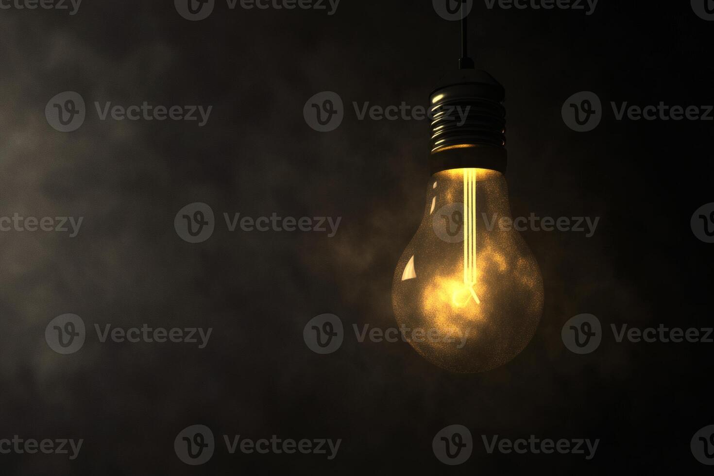 Mysterious glow from a vintage light bulb in darkness. photo