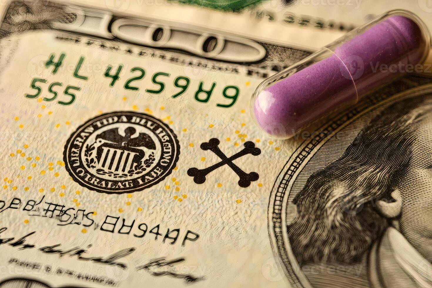 Colorful capsule rests atop a hundred dollar bill in a tense juxtaposition. photo