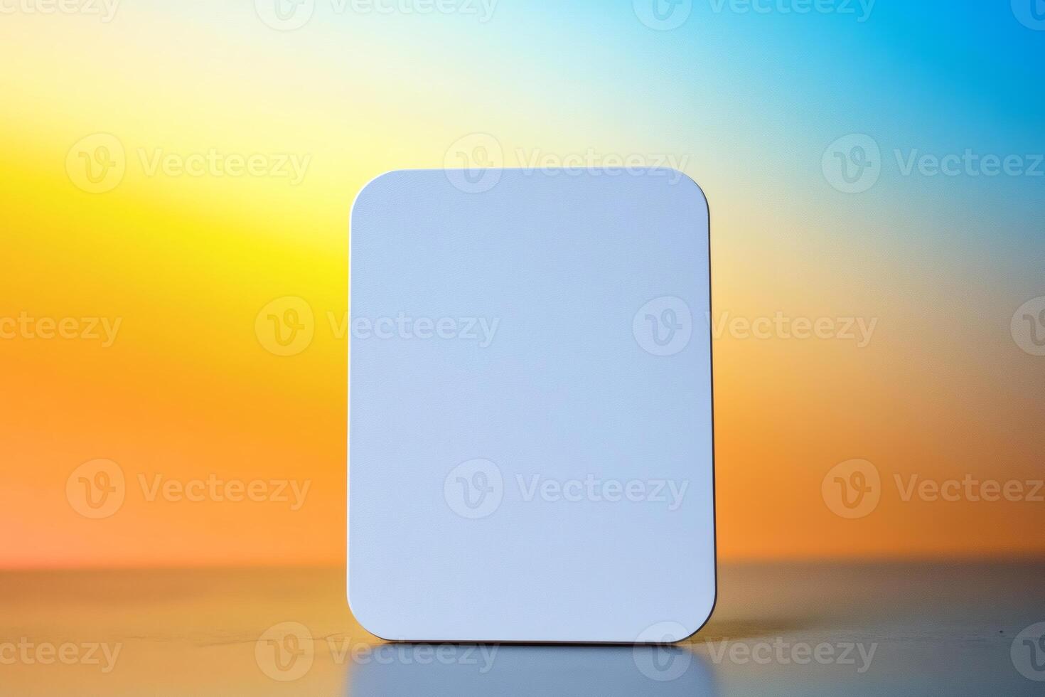 Minimalist tablet on a serene sunset backdrop inspires creativity. photo