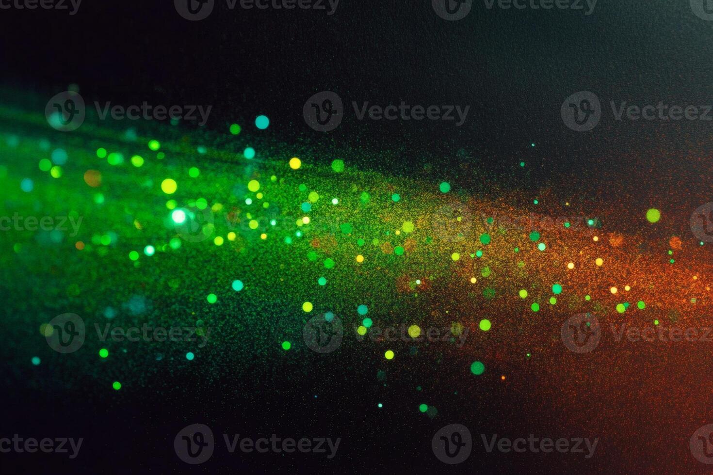 Vibrant particles dance through the dark, creating a mesmerizing cosmos effect. photo