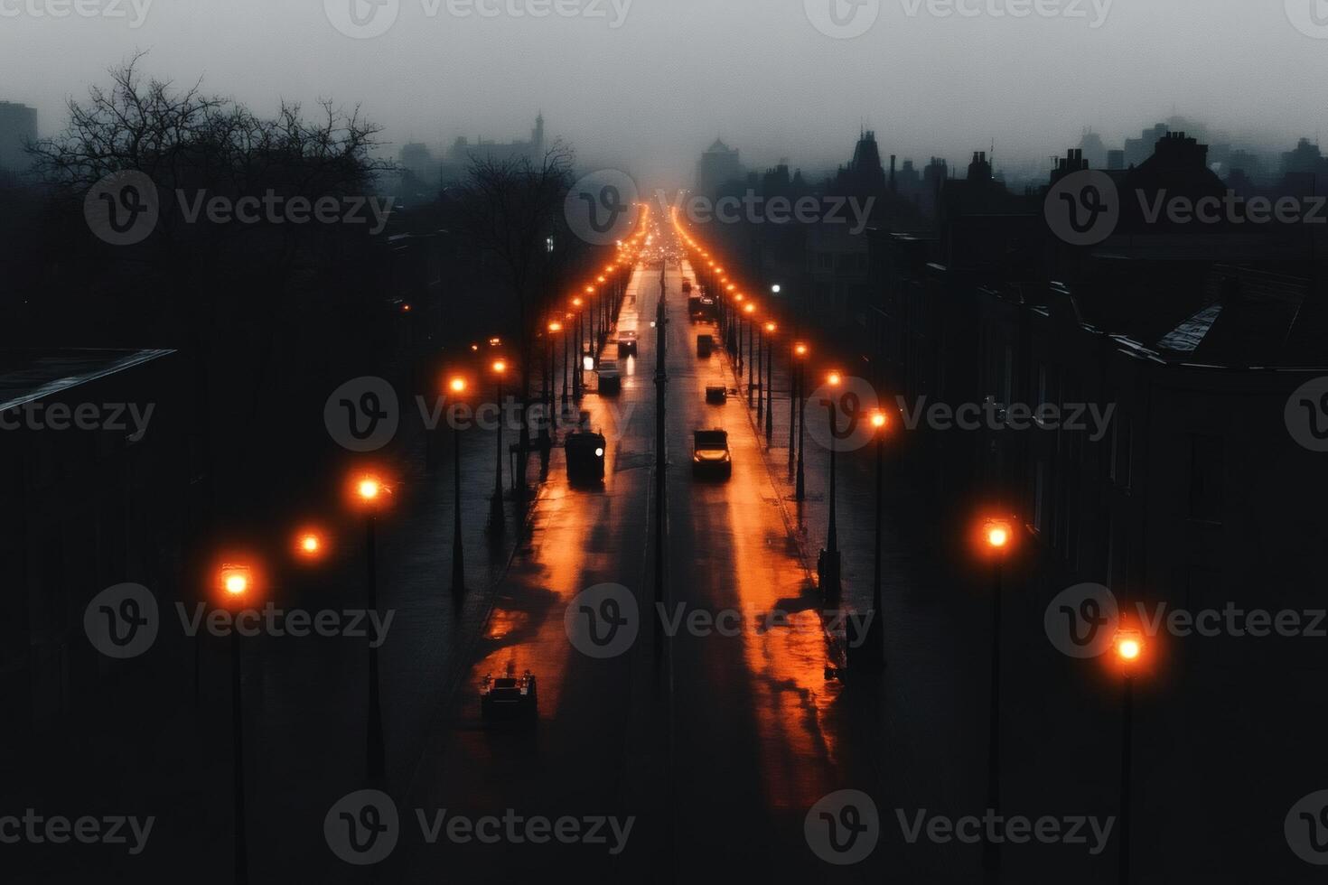 Twilight glow illuminates a quiet city street in the misty evening fog. photo