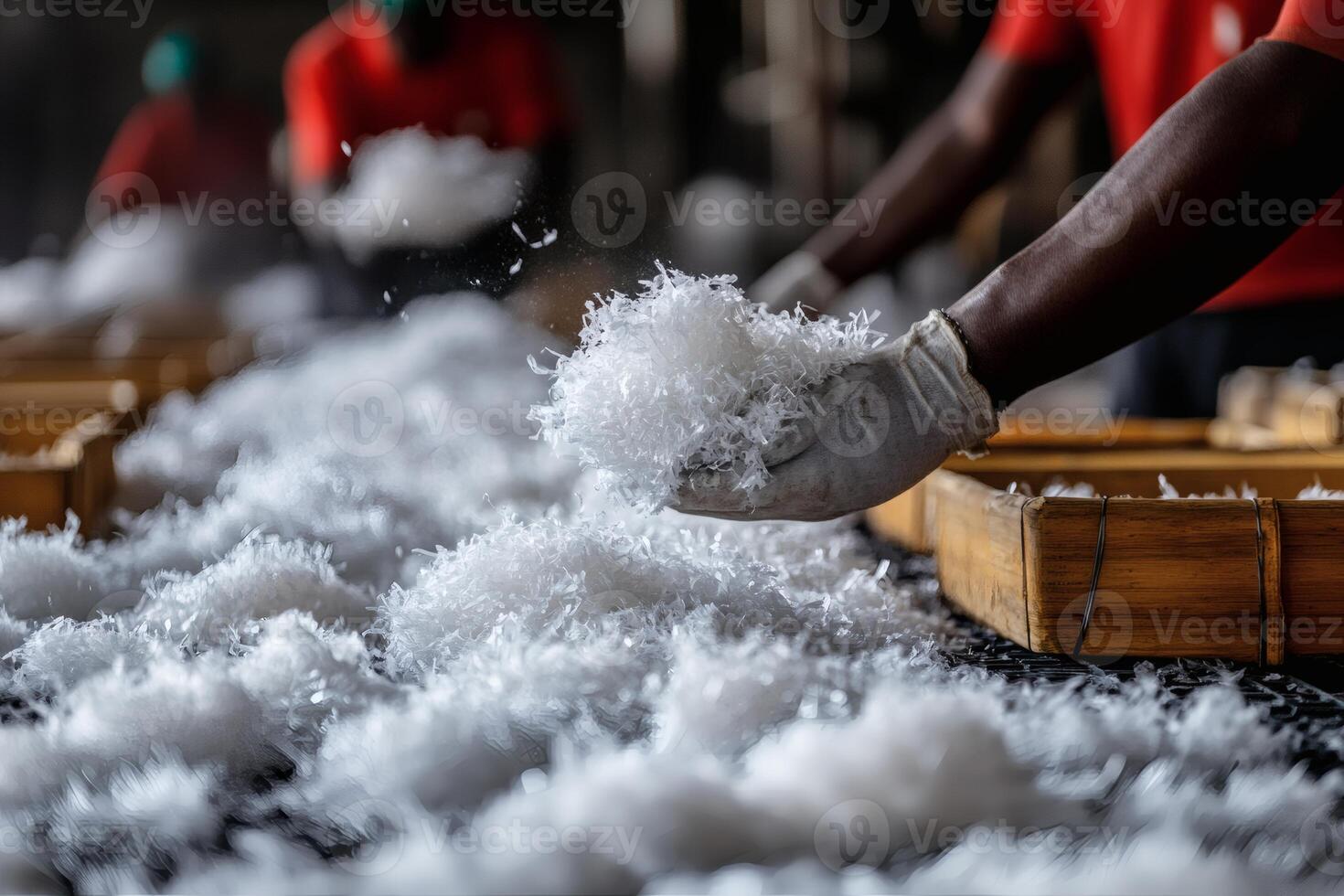 Workers Sorting and Processing Synthetic Fibers in a Textile Factory. photo