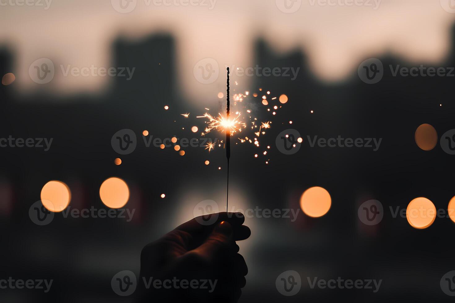 Celebratory Sparkler Held Against a Blurred City Backdrop During Twilight. photo
