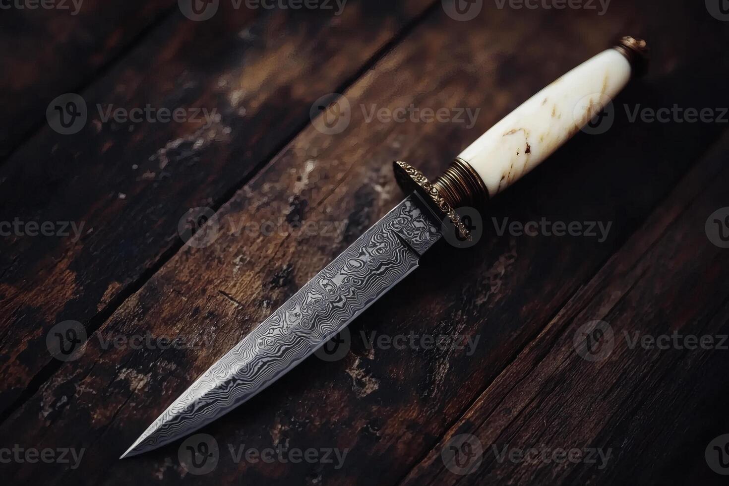 Knife on rustic wood surface - photo