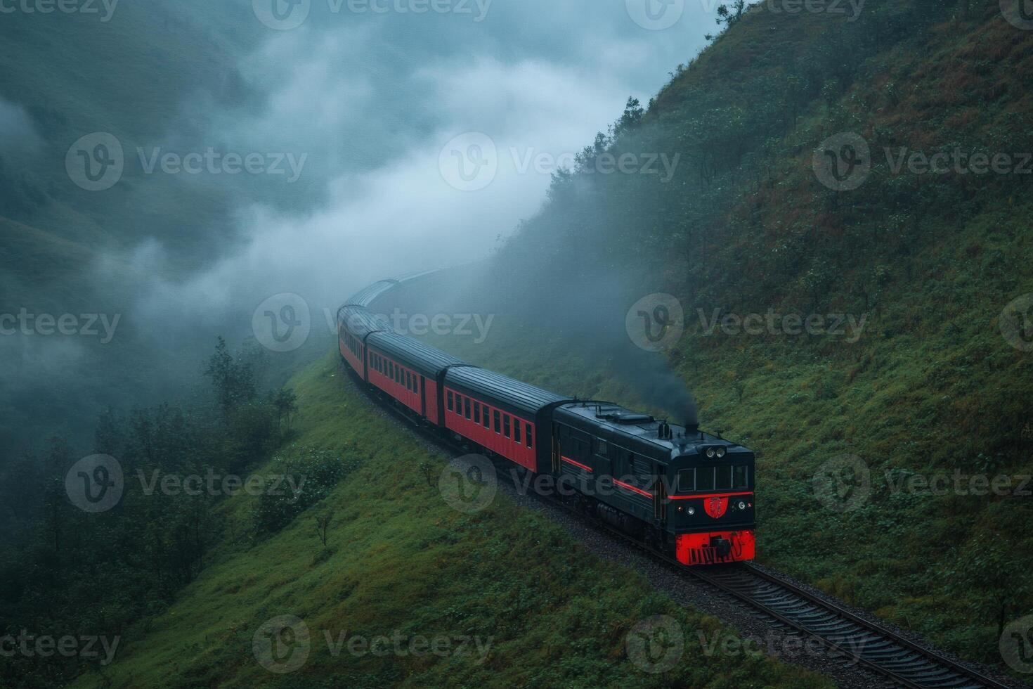 Train journey through misty mountainscapes photo