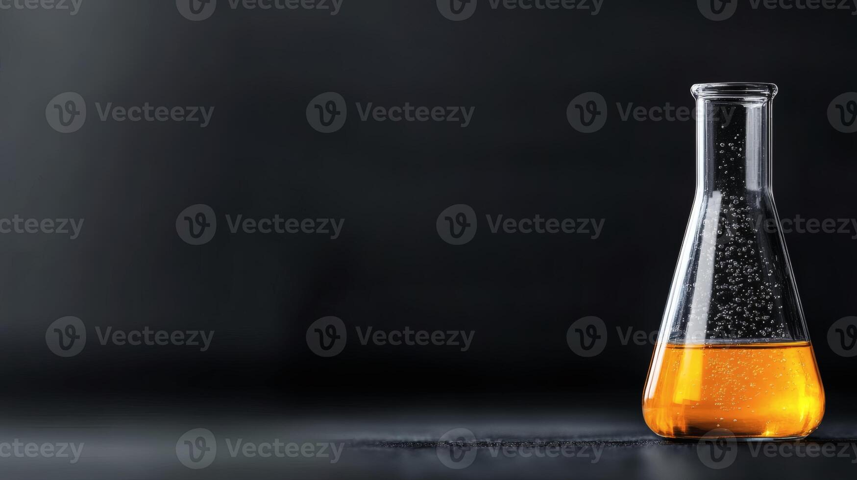 Elixir bubbling in Erlenmeyer flask photo