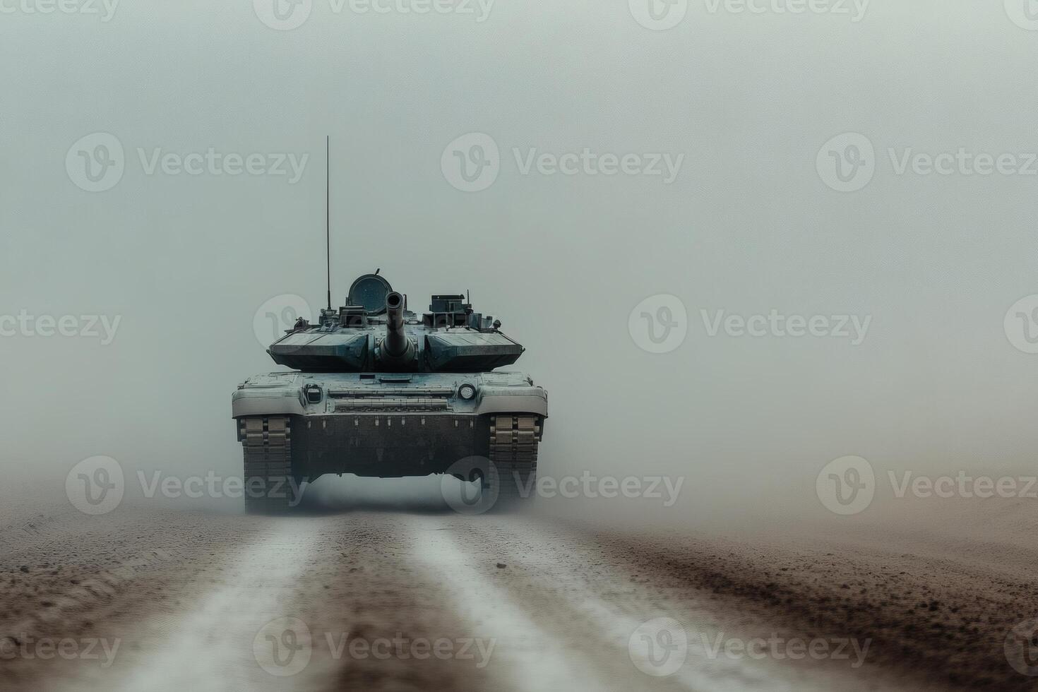 Military tank moves through dusty terrain in a dramatic display of power and resilience during a hazy afternoon photo