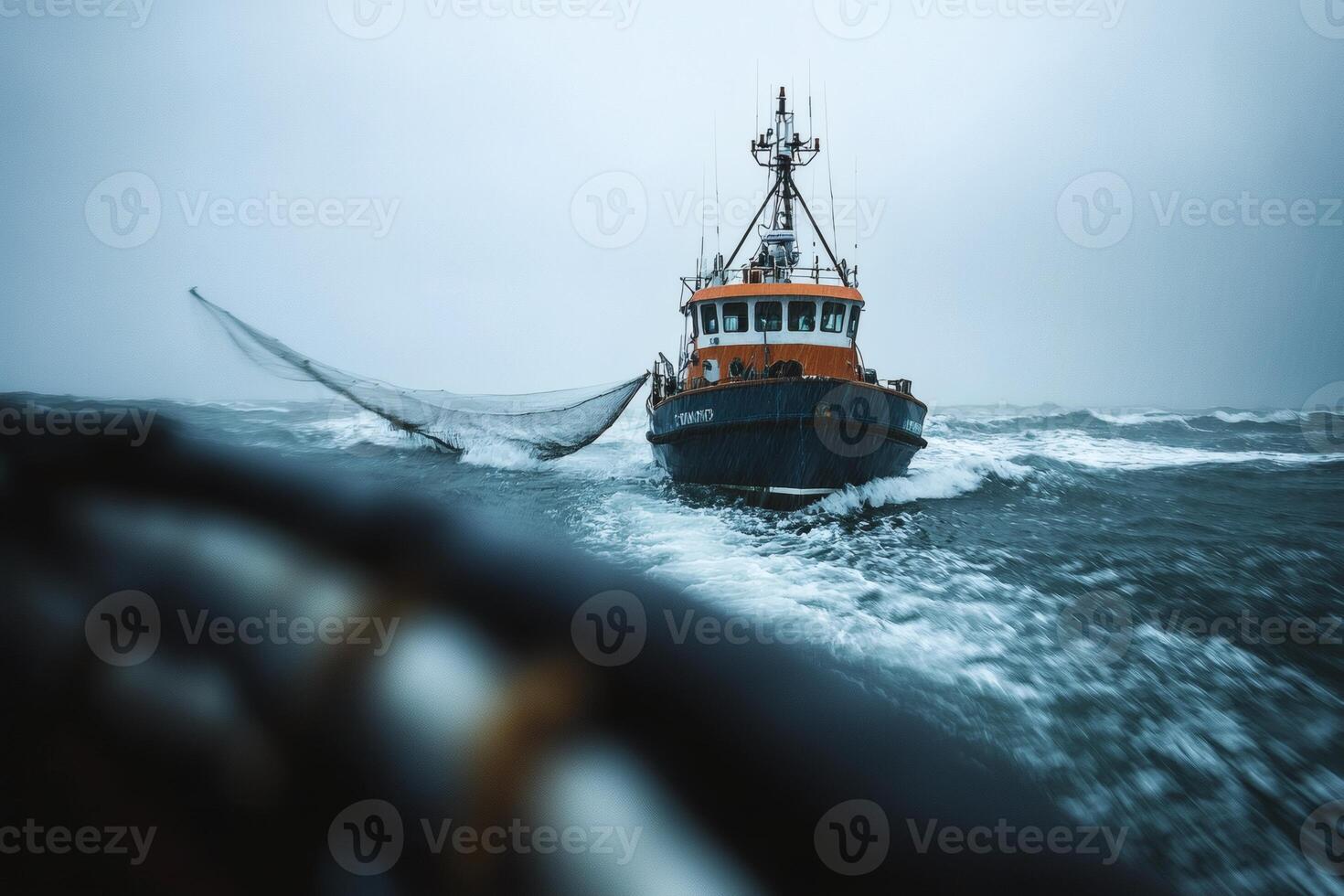 Navigating through turbulent waters, a fishing vessel battles waves under a stormy sky photo