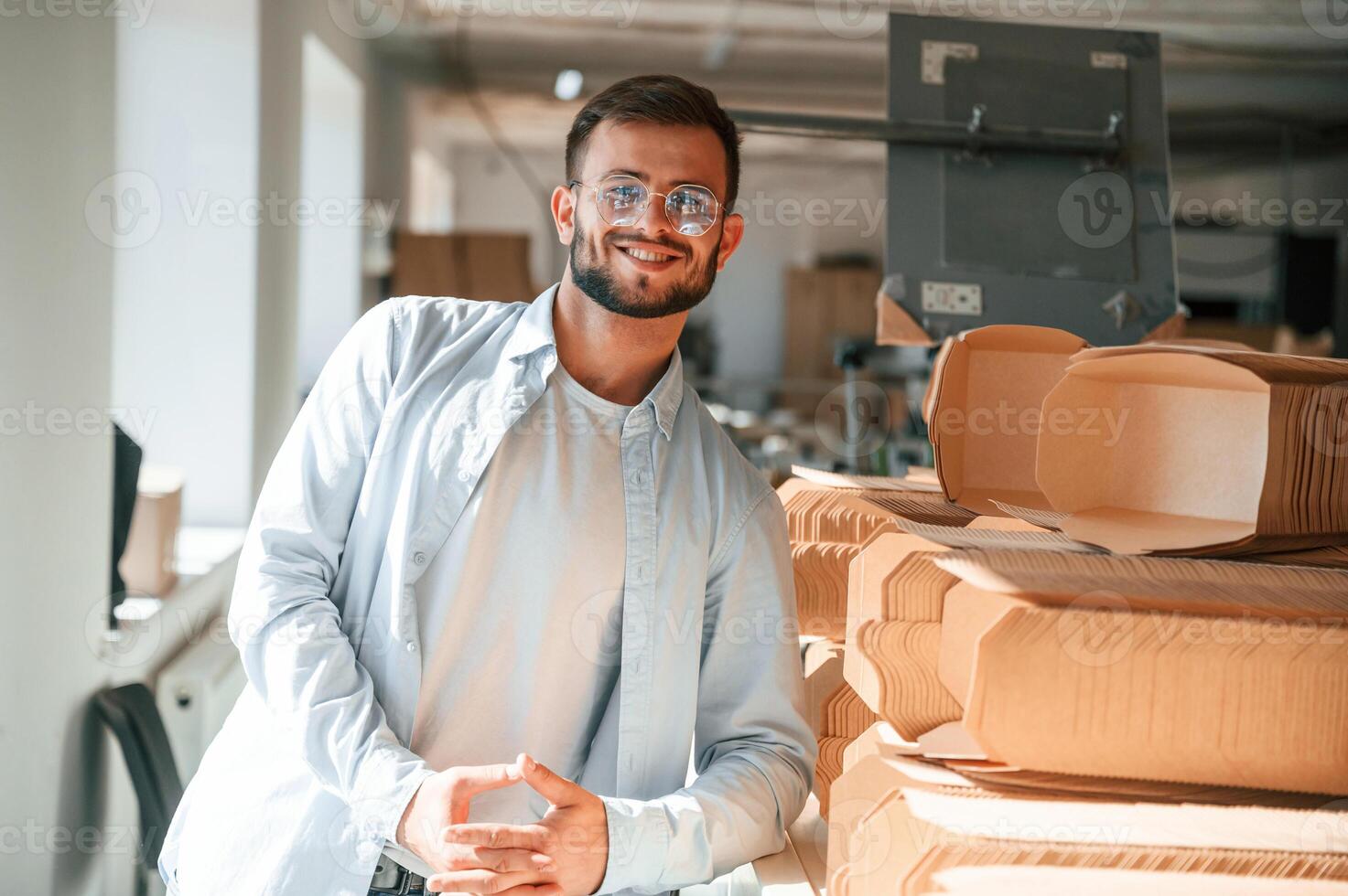Print, house worker in white clothes is indoors photo