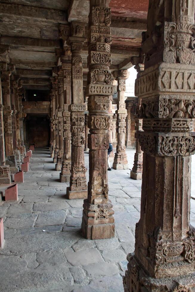 Delhi India February 14, 2025 Column at The Qutub Minar, a towering historical minaret in Delhi, India. photo