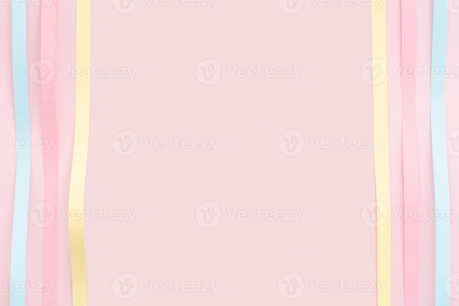 Paper strips frame on pink background photo
