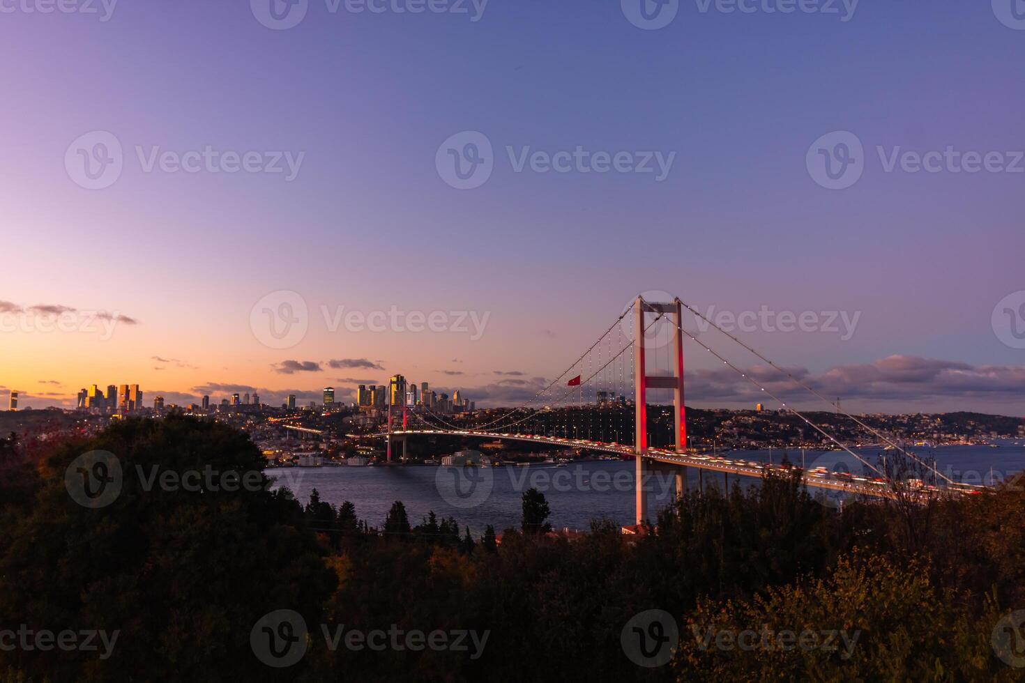 Istanbul view at sunset. Bosphorus Bridge and cityscape of Istanbul photo