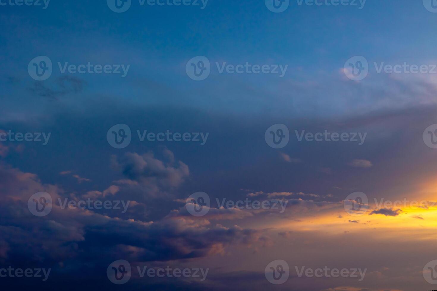 Cloudscape at sunset. layered clouds at sunset photo