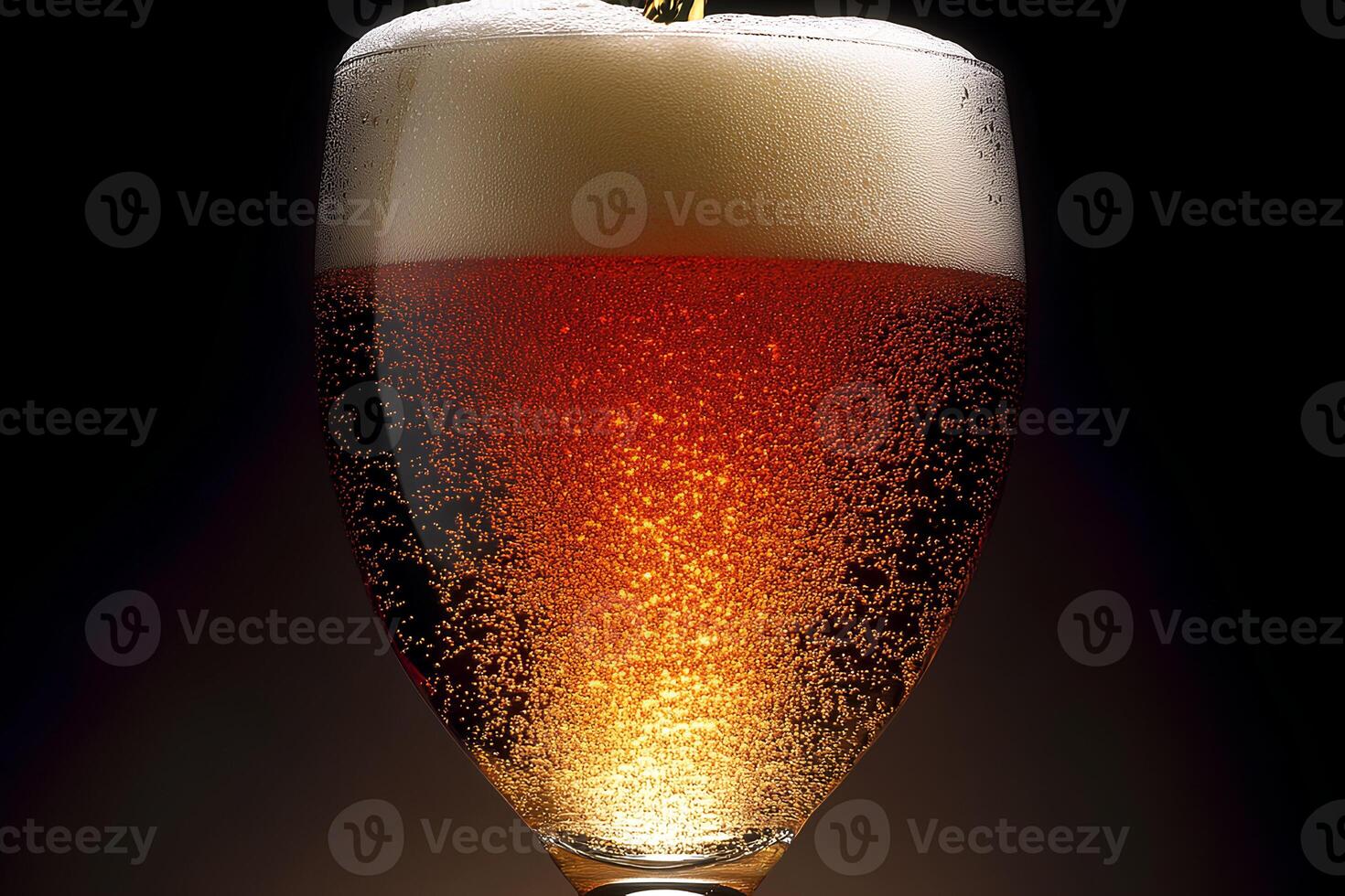 Close-up of a glass of beer with a thick foam head, set against a dark background, highlighting its refreshing appeal photo