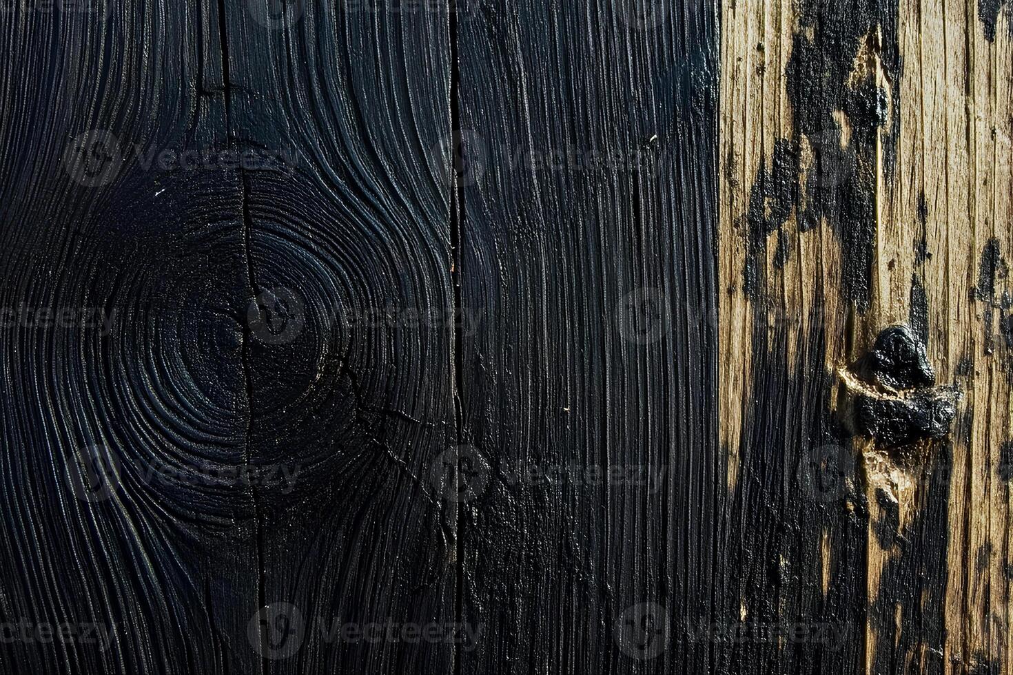 Close-up of old black wood texture, creating an abstract and rustic background for design purposes photo