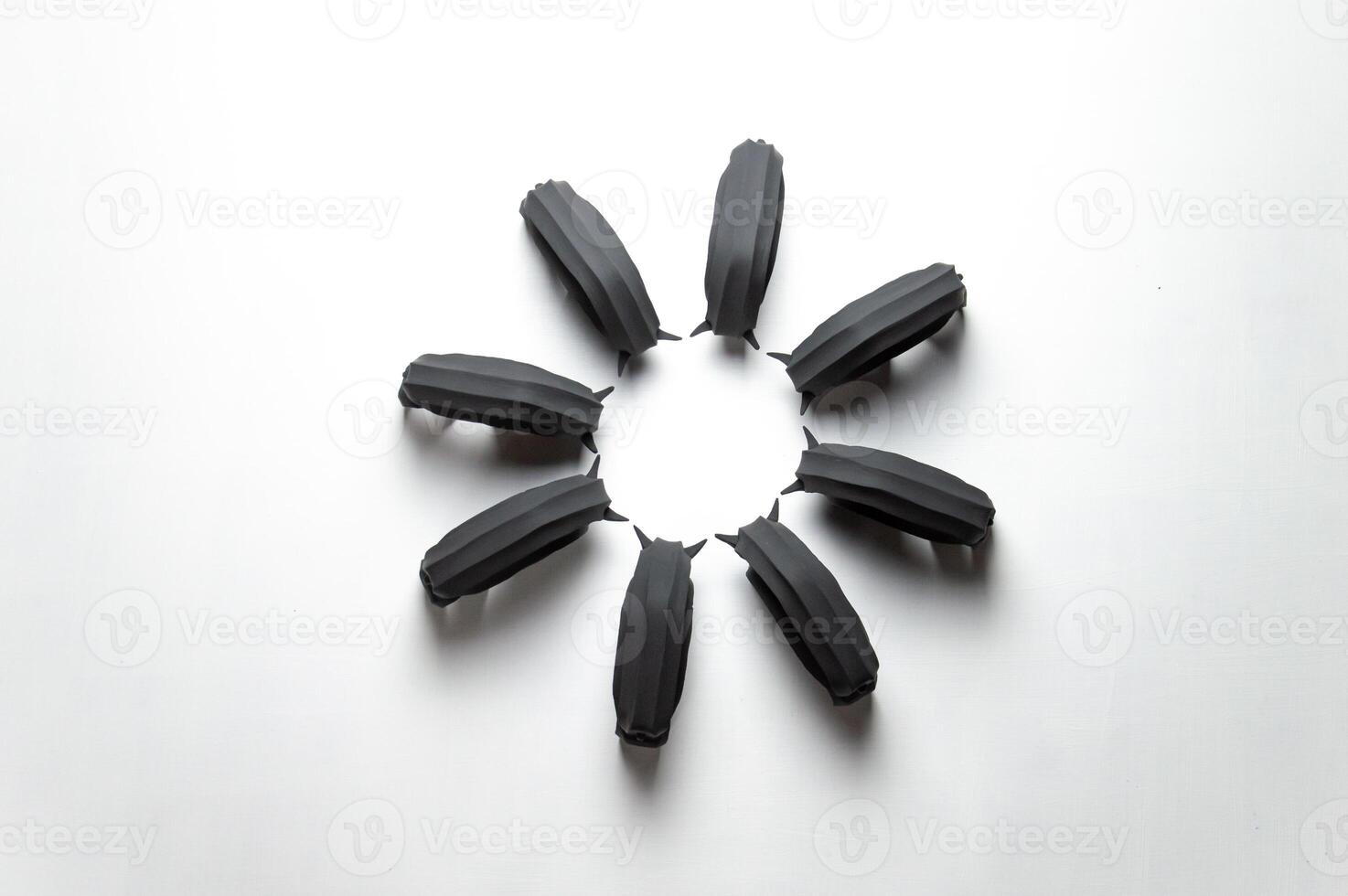 A herd of gypsum black bison stand in a circle. Abstract background isolated figures for interior. High quality photo