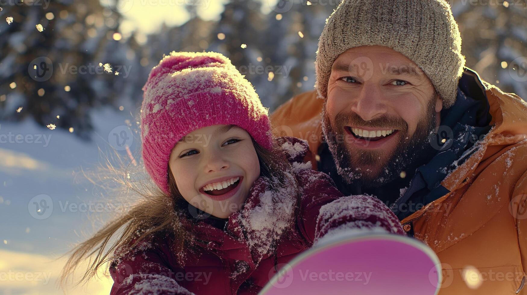A man and a young girl are taking a selfie in the snow photo