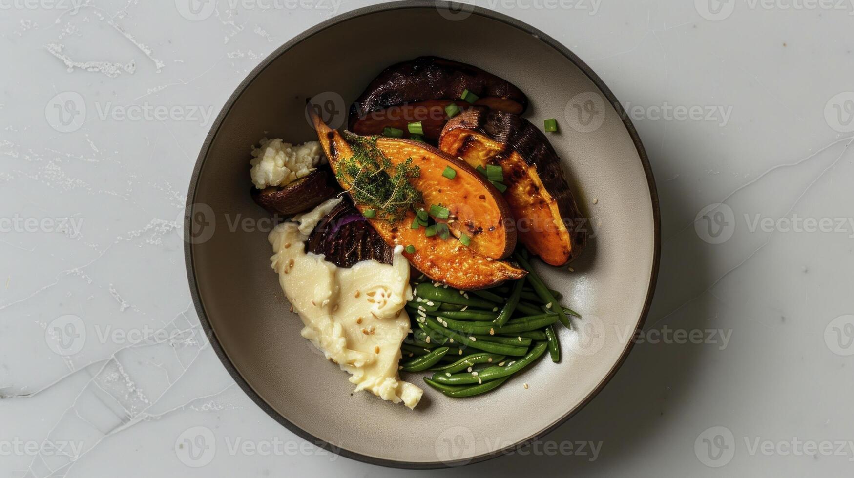 A plate with mashed potatoes, green beans and carrots photo