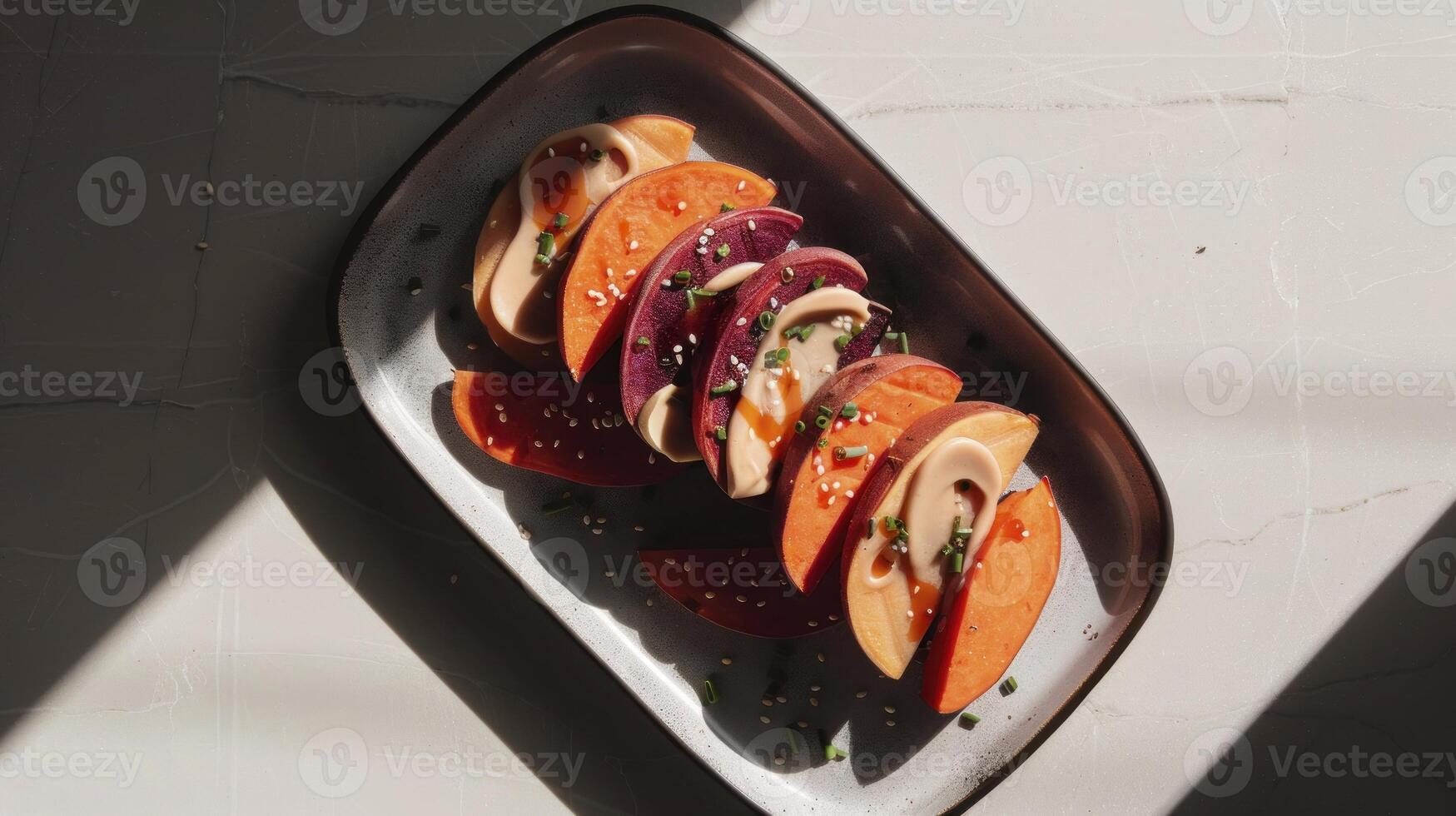 A plate with sliced up vegetables on it photo